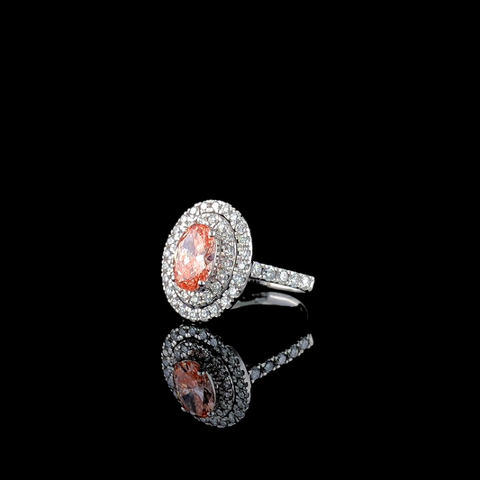 Vivid Pink Oval Cut Diamond Style Ring with Double Halo.