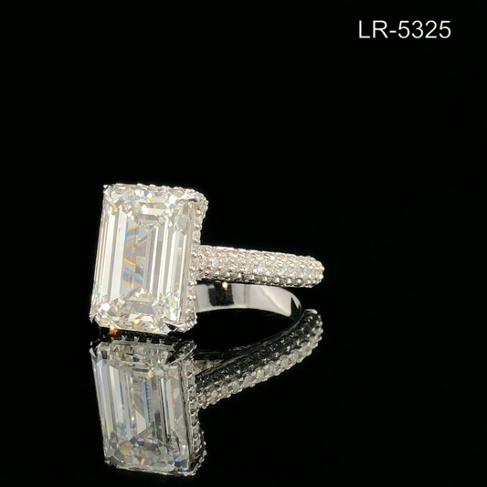 Emerald Cut Diamond Ring with Hidden Halo and Pavé Band.