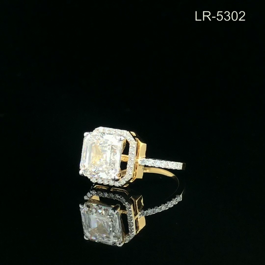 Asscher Cut Diamond Halo Ring with Pavé Band.