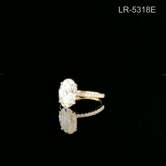 Oval Cut Diamond Solitaire Ring with Pavé Band.