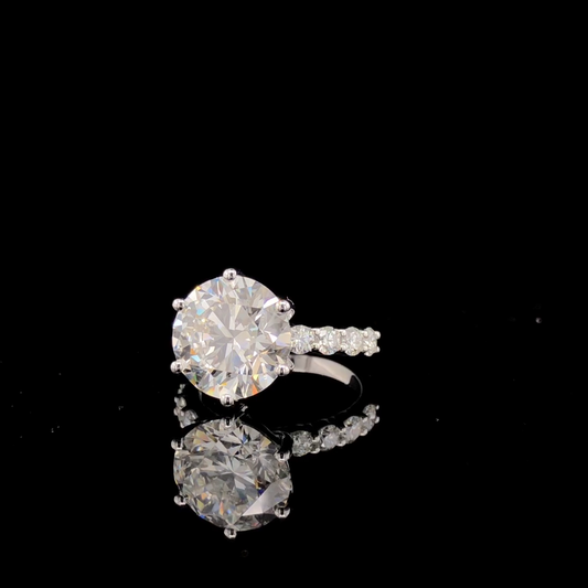Round Brilliant Solitaire Engagement Ring, Shared Prong Diamond Band.