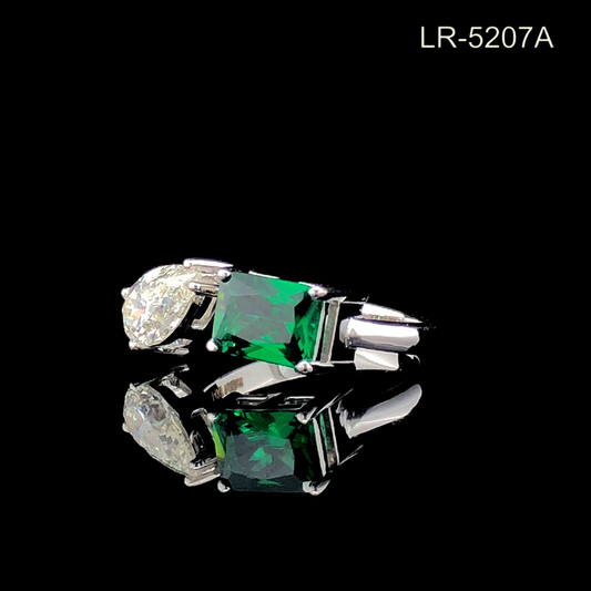 Pear Cut Diamond and Emerald Cut Green Stone Toi et Moi Ring.